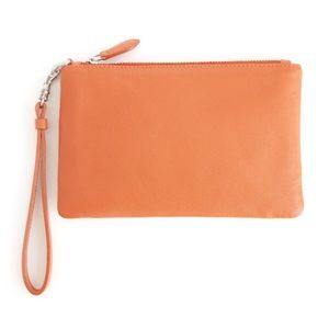 NWOT Royce Leather Orange Zip Wristlet